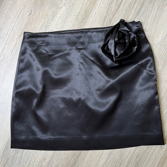 Endless Rose Black Satin Mini Skirt with Floral Accent - Picture 1 of 3